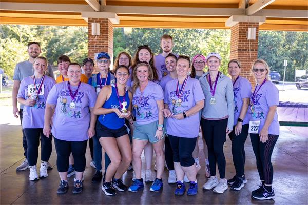 Runners with medals following race